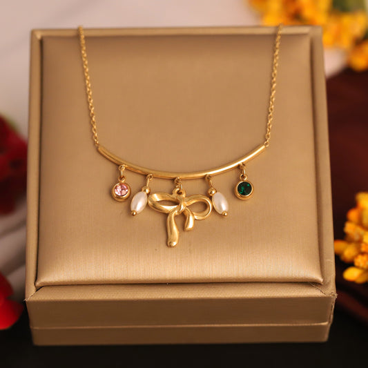 Elegant Gold Bow Necklace with Pearls & Gemstone Charms