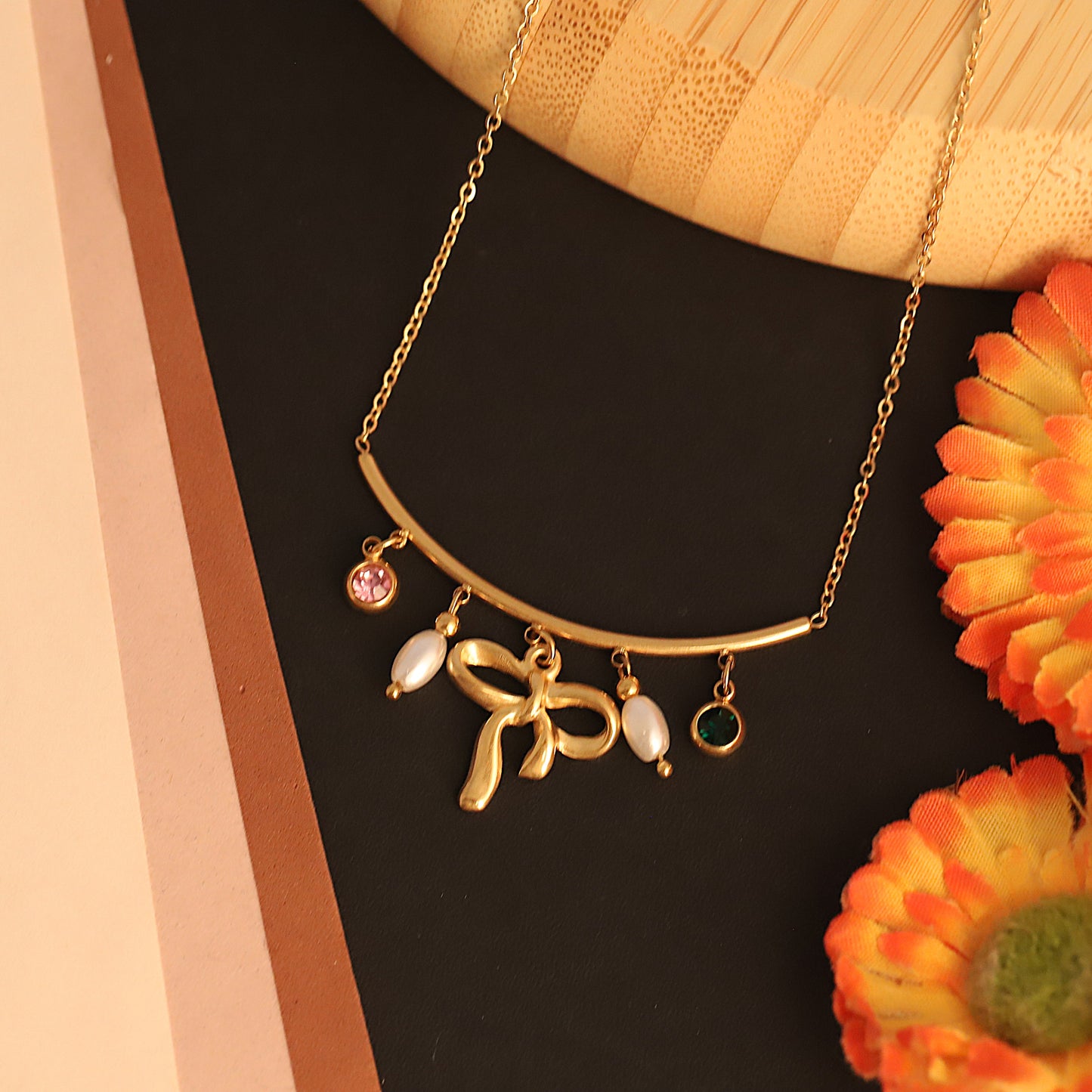 Elegant Gold Bow Necklace with Pearls & Gemstone Charms
